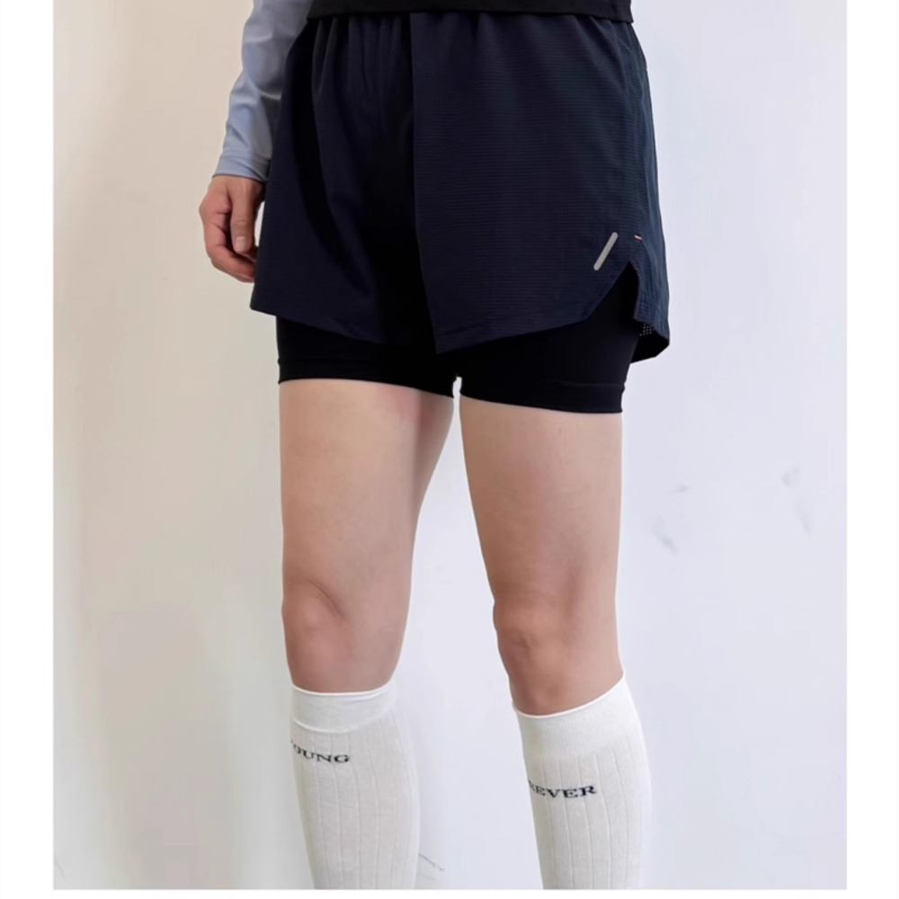 Dames sportshorts met dubbele  - Running Gear Junior recensie en prijs